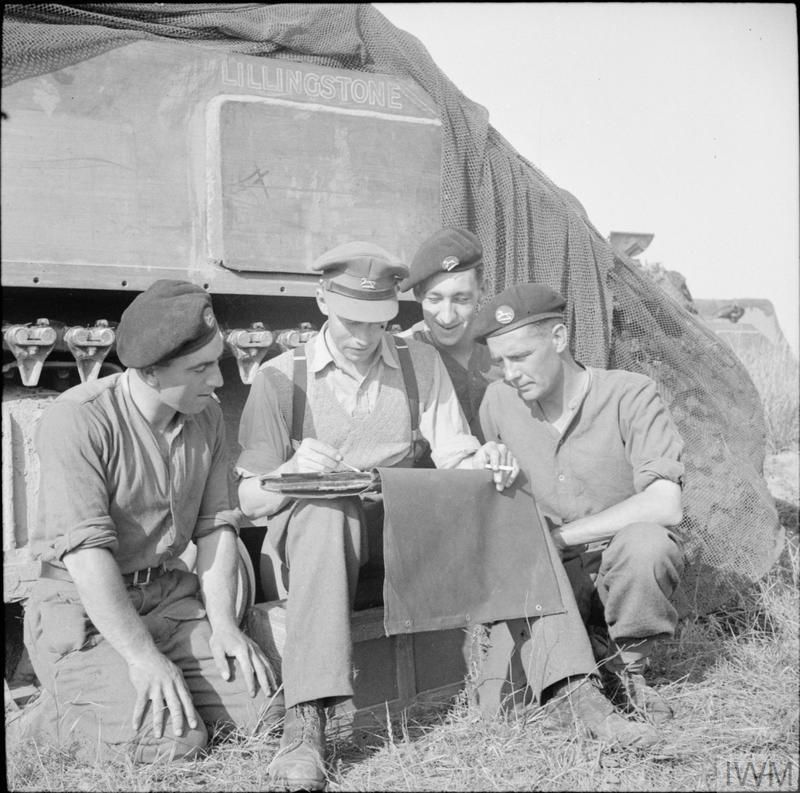 British tank crew by their tank