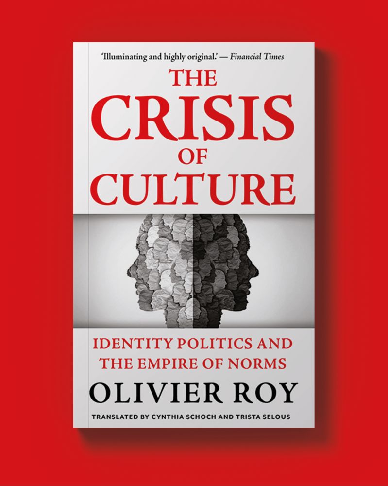 A mock-up of the paperback cover of The Crisis of Culture against a red background. The cover features an image of two heads, back to back, in side profile. There is red and black writing that reads 'The Crisis of Culture: Identity Politics and the Empire of Norms.'