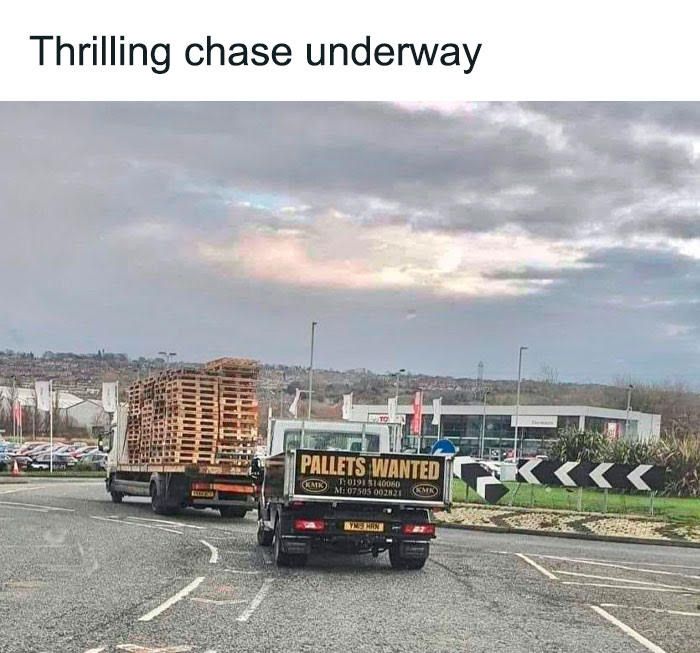 A truck signwritten with "Pallets Wanted" is entering a roundabout behind another truck loaded with pallets.

There's a heading that says "Thrilling chase underway"