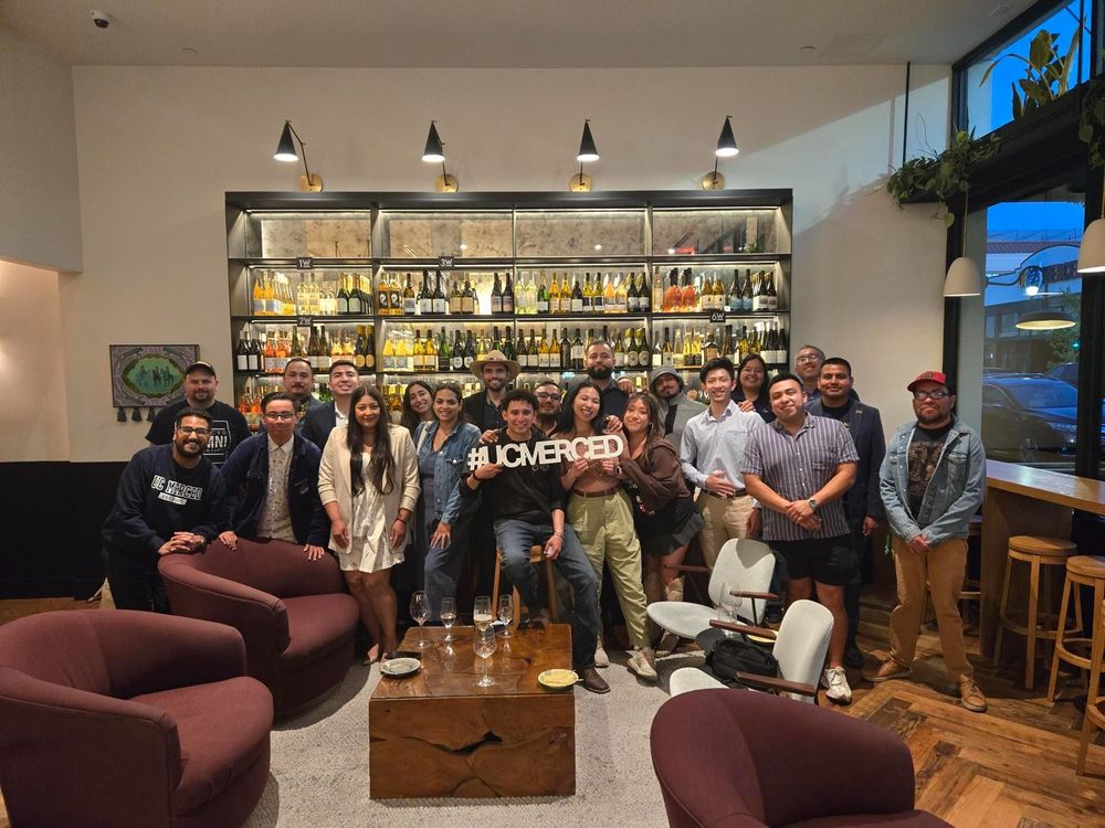 Alumni and friends come together after a Merced mixer in downtown Merced.