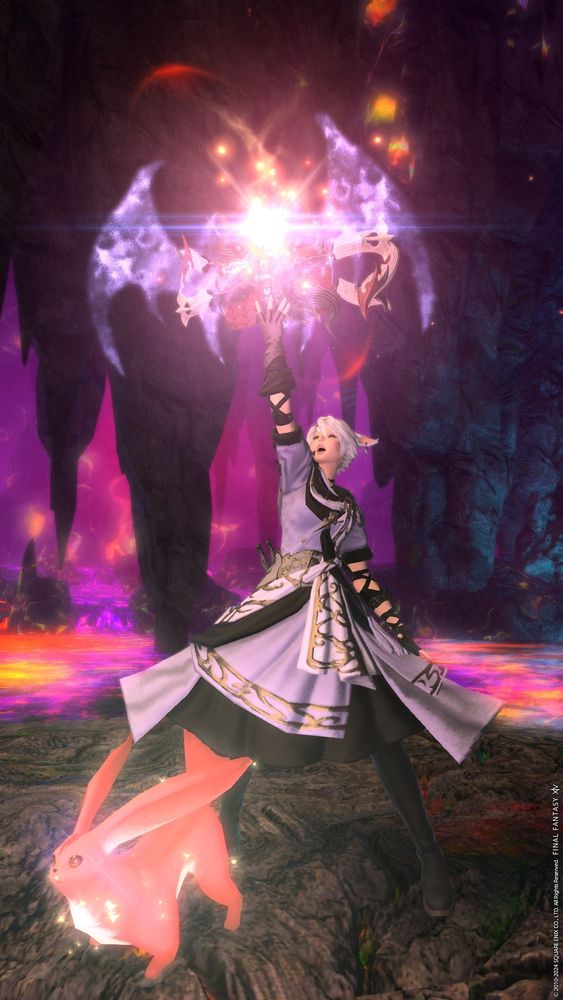 a final fantasy 14 screenshot of a summoner in lilac robes raising a glowing book with sharp dragon wings.