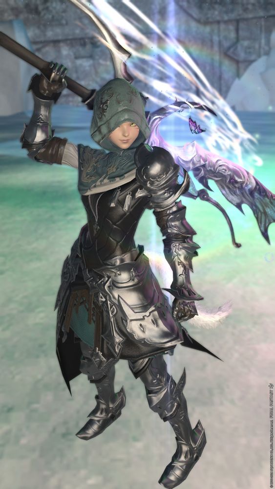 a final fantasy 14 screenshot of a knight in black and silver armour, wearing a green hood.  a large, glowing sword resembling a butterfly wing rests on her shoulder.