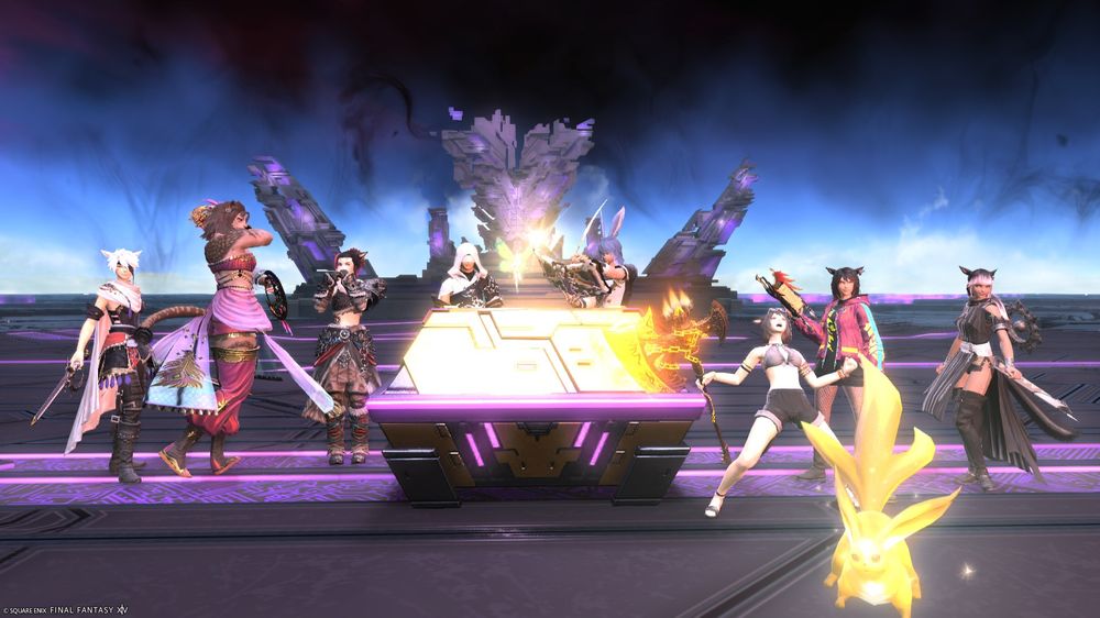 a group of warriors of light posing around a treasure chest