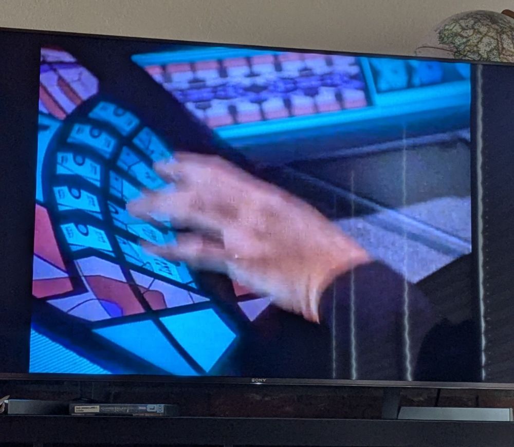 Dax's station in ops looking surprisingly custom and trans flag colored