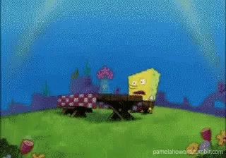 a cartoon of spongebob sitting at a picnic table with the words " i need it " above him