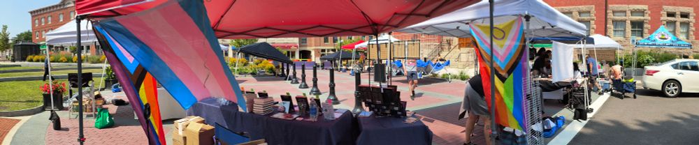 a panorama showing the full market and construction vehicles