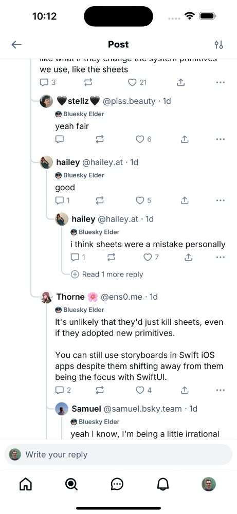 Another screenshot of an iPhone running a development version of the Bluesky app. Pictured is a new post thread "tree" view which has more clear reply lines and relationships between replies beneath an anchor post.