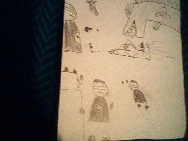 A montage of Darkness and his clones fighting against his enemies, The Ninjas, and a clown piloting a dinobot.
Taken on a Nintendo DSi in 2009, the quality is not exactly the best