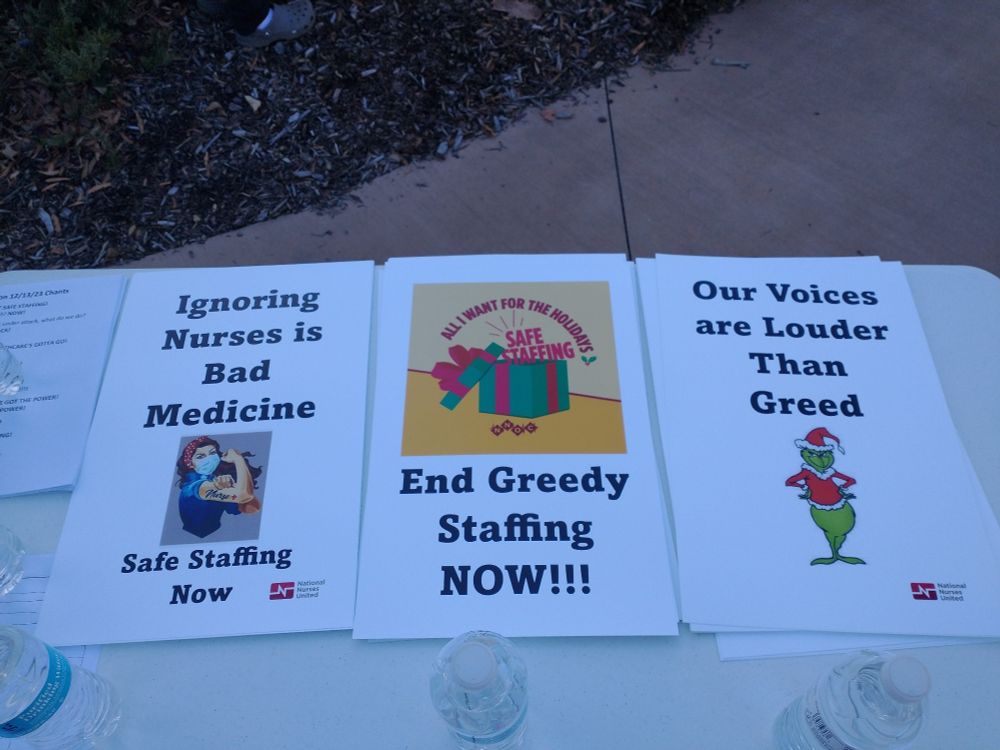 Rally signs supporting proper nurse staffing at Mission Hospital