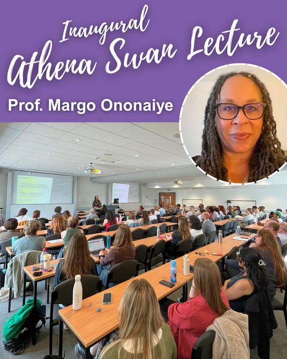 A picture of Prof Margo Ononaiye, a black woman with glasses and dreadlocks, delivering the Athena Swan lecture to University of Bath attendees.