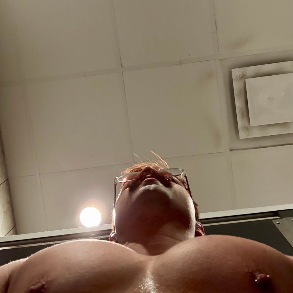 Picture of a man from below a protruding chest