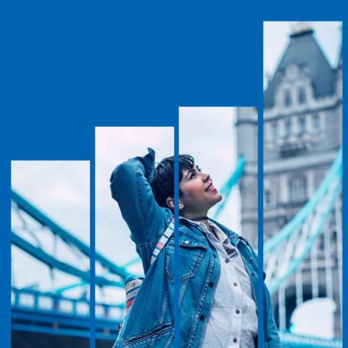 There is a photo of a woman looking around at Tower Bridge. The photo is embedded in the shape of a graph.