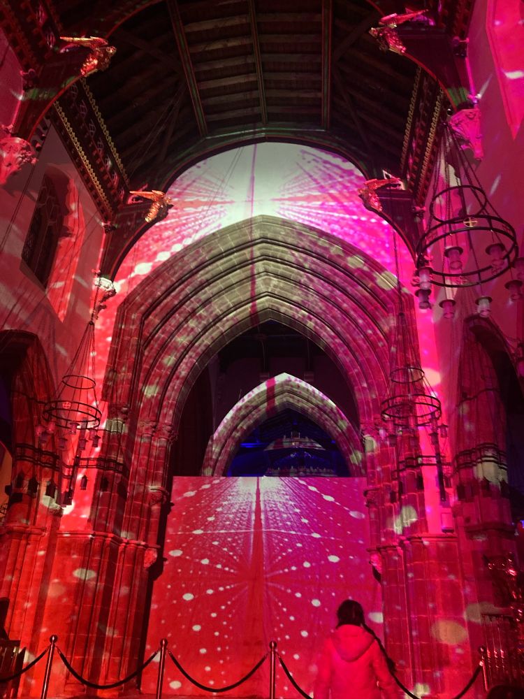 Colourful light projections inside Leicester Cathedral.