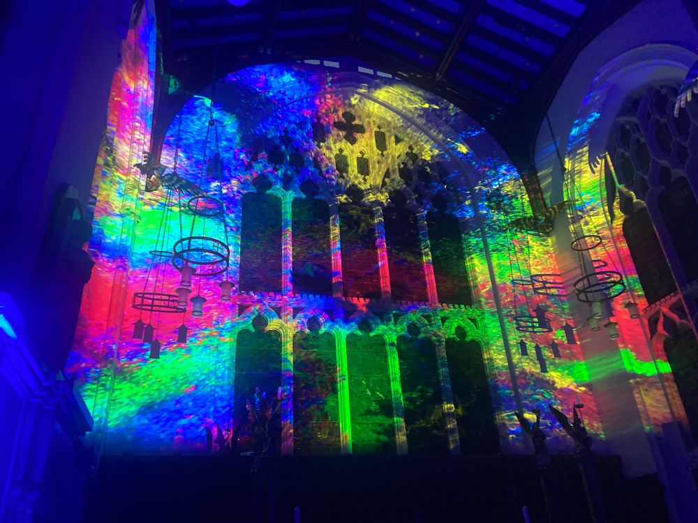 Colourful light projections inside Leicester Cathedral.