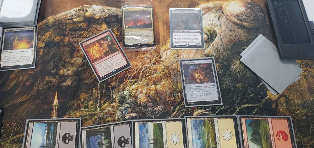 Magic: the Gathering — Adventures in the Forgotten Realms pre-release July 16, 2021 - Mardu (White, Black, Red) deck 
___
Wish
{2}{R}
Sorcery

You may play a card you own from outside the game this turn.

“If you had just one wish, what would it be? Gold, or angel song? Finding a lost love, or finding your way back home? Let me sing a song about one wish that came true …”
—Ellywick Tumblestrum

Illustrated by Ekaterina Burmak
———
Tiamat
{2}{W}{U}{B}{R}{G}
Legendary Creature — Dragon God

Flying

When Tiamat enters, if you cast it, search your library for up to five Dragon cards not named Tiamat that each have different names, reveal them, put them into your hand, then shuffle.

“My children will rule over all!”

7/7
Illustrated by Chris Rahn
———
Forsworn Paladin
{B}
Creature — Human Knight

Menace

{1}{B}, {T}, Pay 1 life: Create a Treasure token.

{2}{B}: Target creature gets +2/+0 until end of turn. If mana from a Treasure was spent to activate this ability, that creature also gains deathtouch until end of turn.

1/1
Illustrated by Lorenzo Mastroianni
