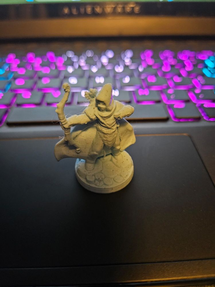 3d printed miniature elf ranger figure.