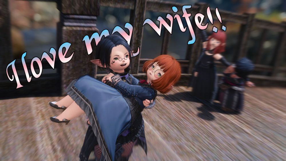 Vinini is held like a princess in her partner's arms, as they yell 'I love my wife!!' A couple behind them cheer & laugh at the display.