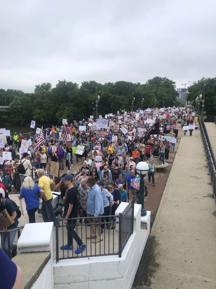Thousand of residents of Greater Lafayette, Indiana, peacefully protesting and asking for the rollback of tyranny on June 14, 2025. Taken on the John T. Myers Pedestrian Bridge over the Wabash river.