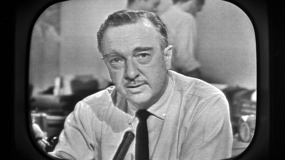 Walter Cronkite waiting to break the news 