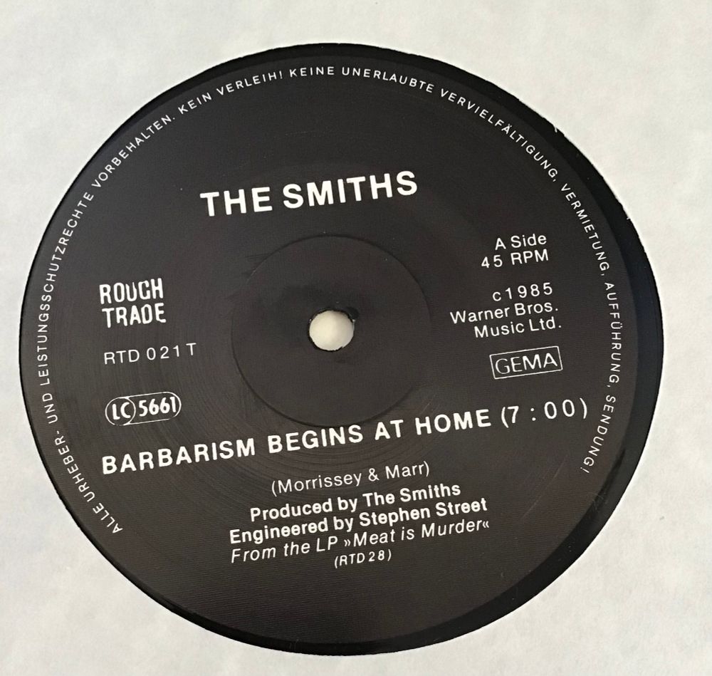 The A-side label for the 12” of Barbarism Begins at Home. 