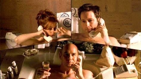 A three-way split screen of Scully, Mulder, and Skinner, each in their own bathtubs, on a conference call on corded telephones.