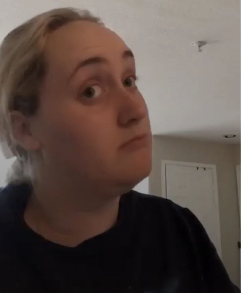 The meme image of Brittany "Kombucha Girl" Broski considering something very deeply.