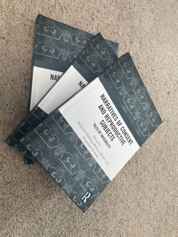 Photo showing three copies of the book Narratives of Consent and Reproductive Subjects in a stack.