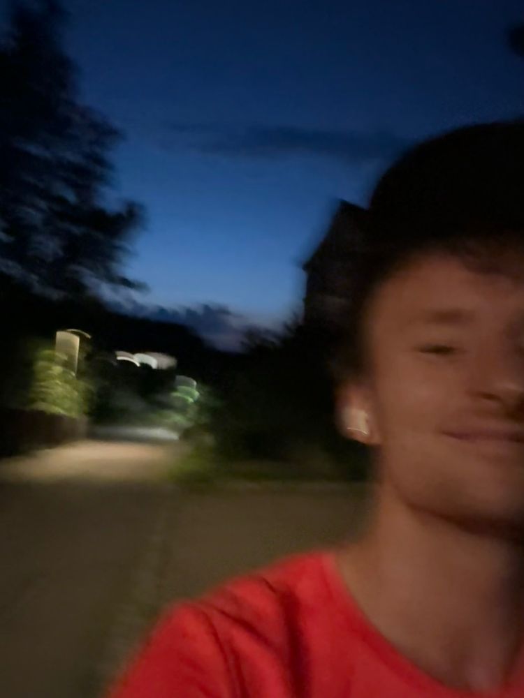 Mid run selfie. Blurry image of me running out of frame.