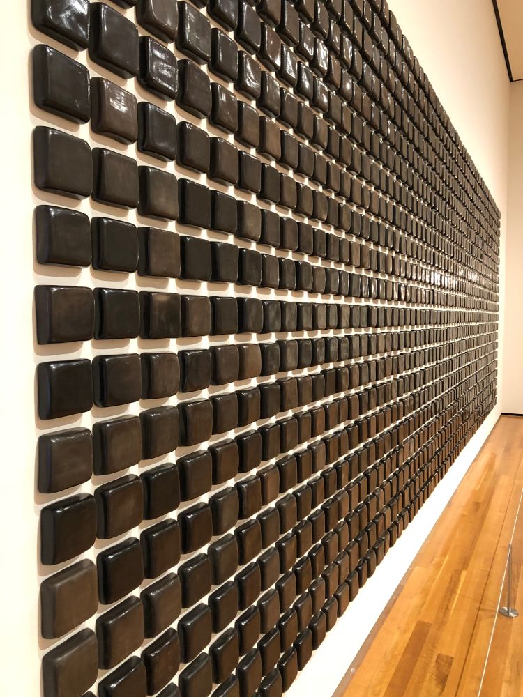 Alternative angle: Cleveland Museum of Art: El manto negro / The black shroud, by Teresa Margolles (Mexican, born 1963) in 2020. 1600 burnished ceramic pieces.