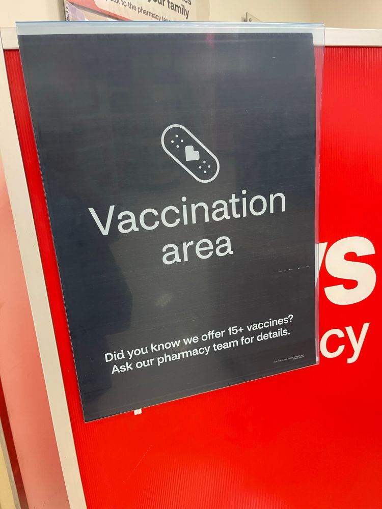 Sign reading vaccination area.
