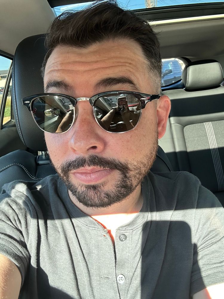 Picture of me in sunglasses after my haircut 