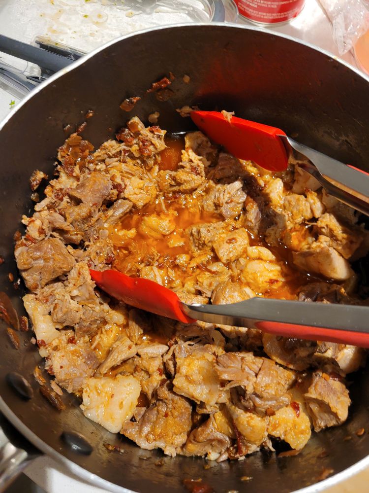 Caritas in a pot with utensils 