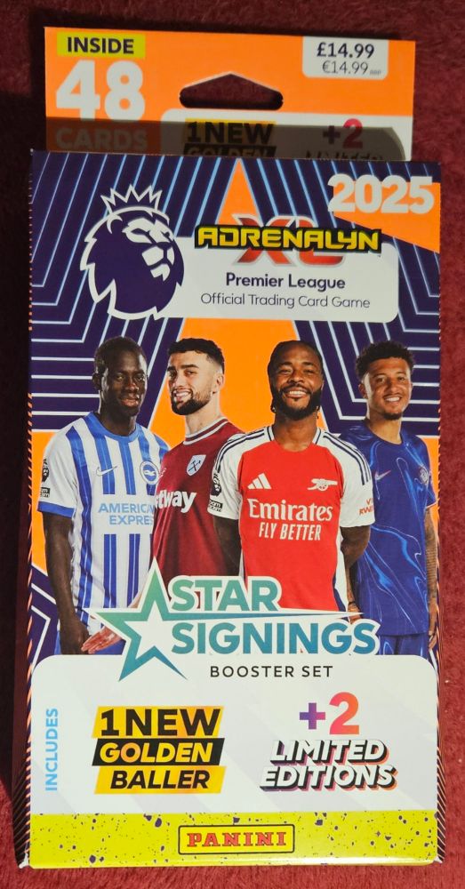 Star Signings Booster Set for Adrenalyn XL: the Premier League Official Trading Card Game, including 2 Limited Edutions and 1 New Golden Baller. No, me neither.