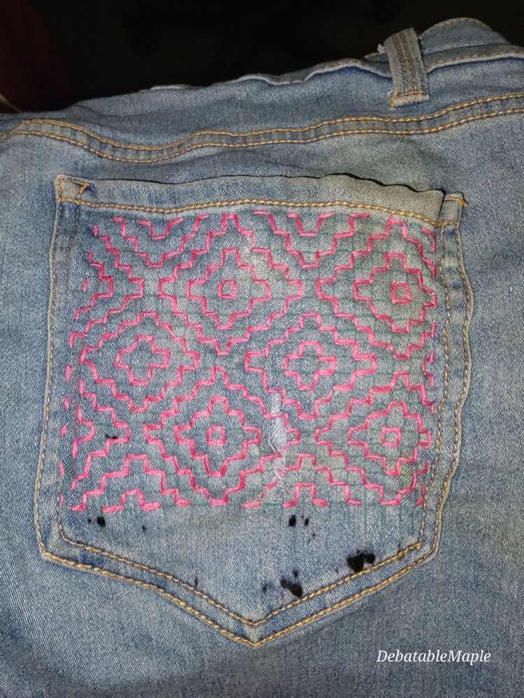 Persimmon flower sashiko visible mending on pocket