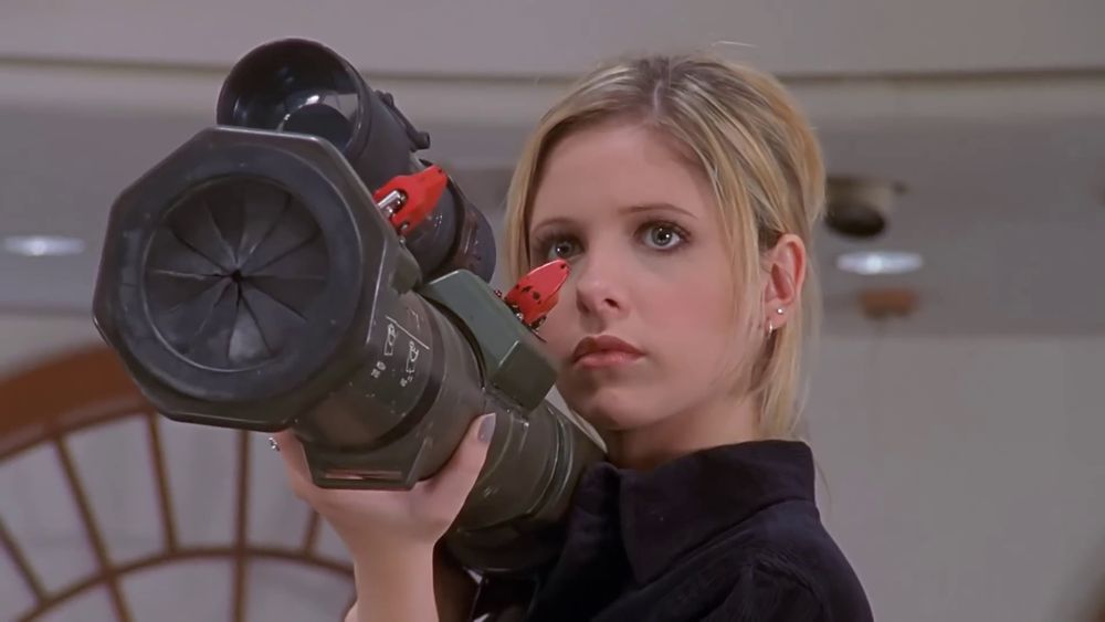 buffy holding a rocket launcher