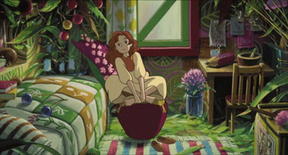 a cartoon of a girl sitting on a red apple in a room