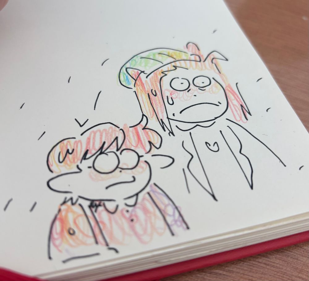 Julian and Ham in Portland wear in the Portland rain.