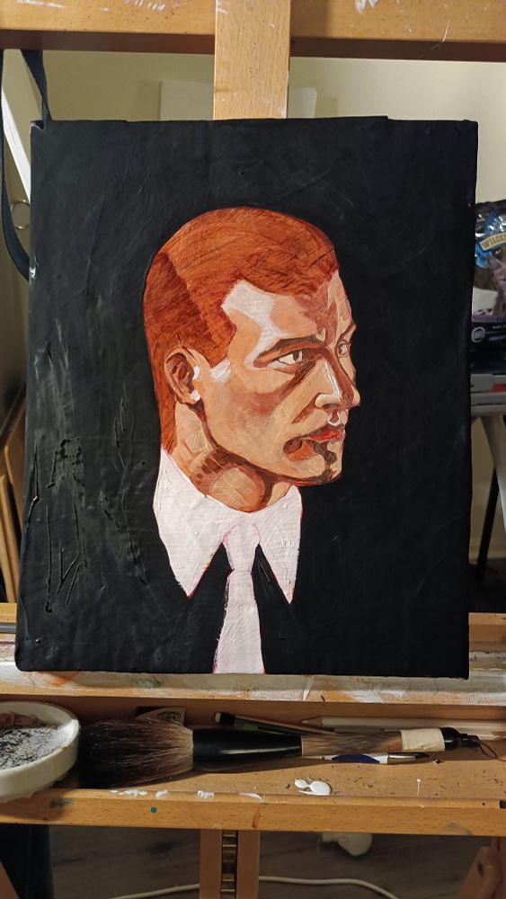 a partially done acrylic painting of aan staring off to the right with a dark background. the details are rough and unfinished. 