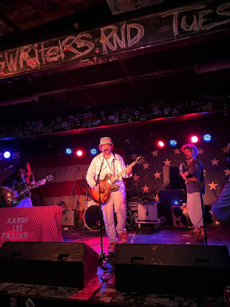 A photo of Aaron Lee Tasjan playing guitar at the Nick in Birmingham Al