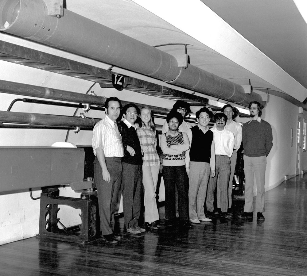 Ben Lee became head of the theory group at the National Accelerator Laboratory (now Fermilab) in 1974. From left are Antonio Pagnamenta, Lee, Mary Gaillard, Shirley Ann Jackson, Robert Savit, Anthony Ichiro Sanda, Satish Joglekar, John Bronzan, and Jochen Bartels. (Photo courtesy of Fermilab.)