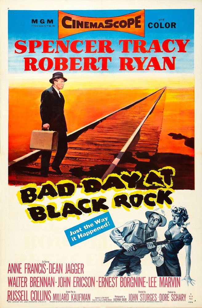movie poster for Bad Day at Black Rock, with Spencer Tracy, he stands in a black suit, carrying a suitcase, between railroad tracks that extend off into a distant point. 