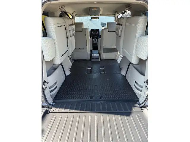 Honda Element interior showing the seats folded up and out of the way to create cargo room