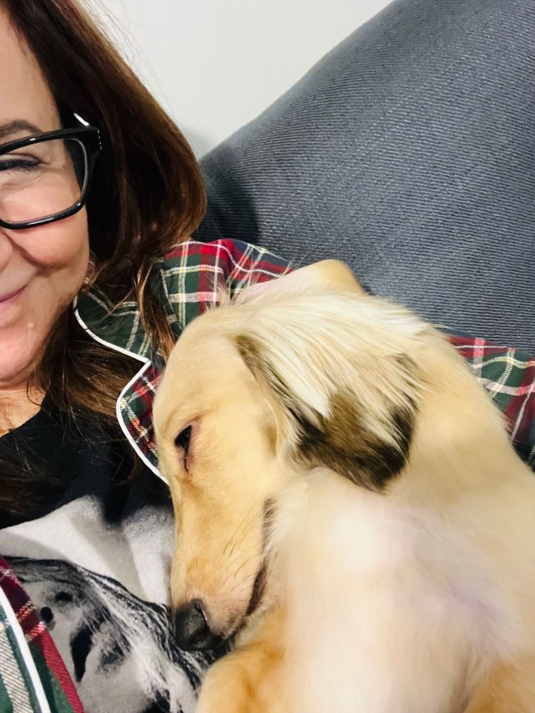 Marie and Theo cuddling on Christmas morning. 
