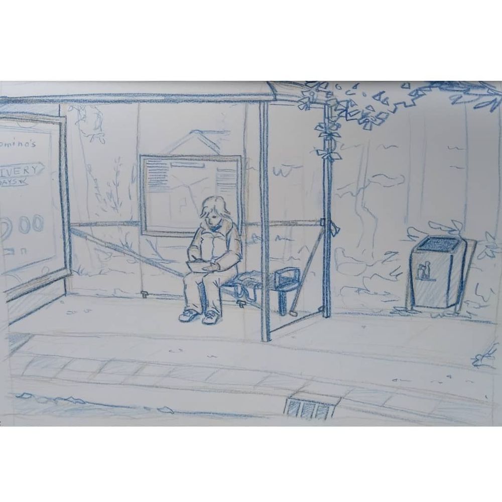 tinted charcoal drawing of a person drawing at a bus stop.