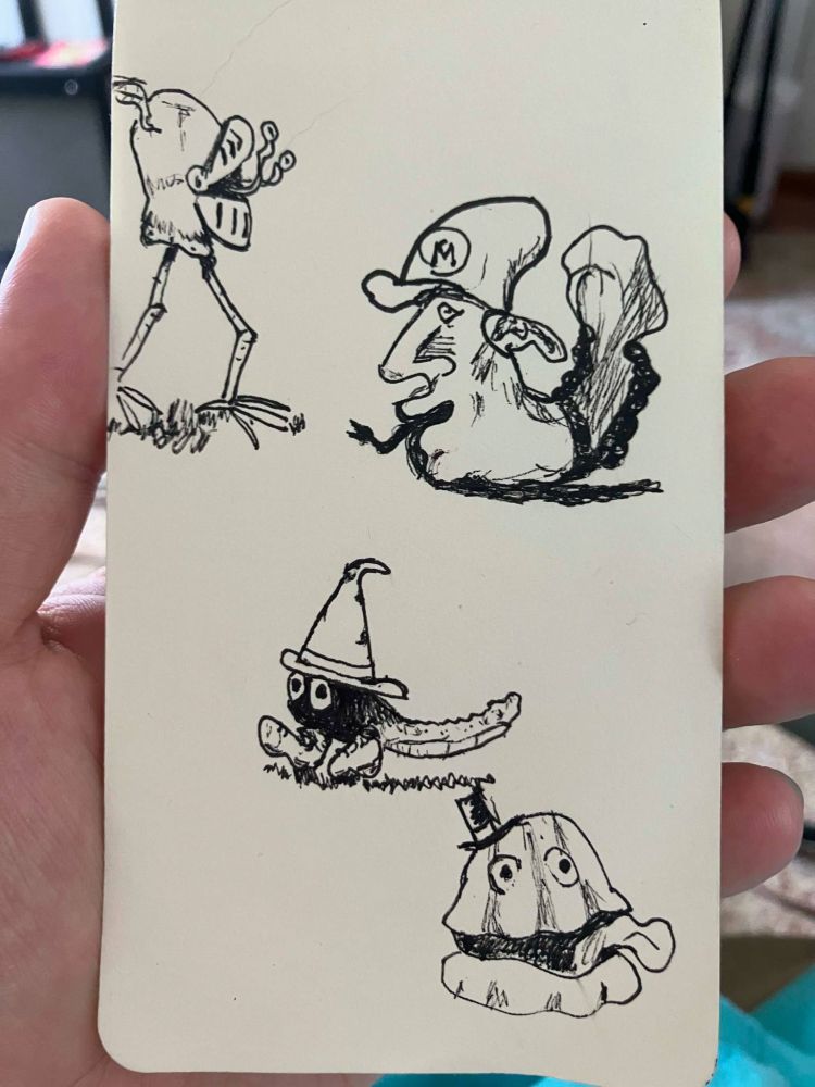 a sketchbook page with some weird little guys. 