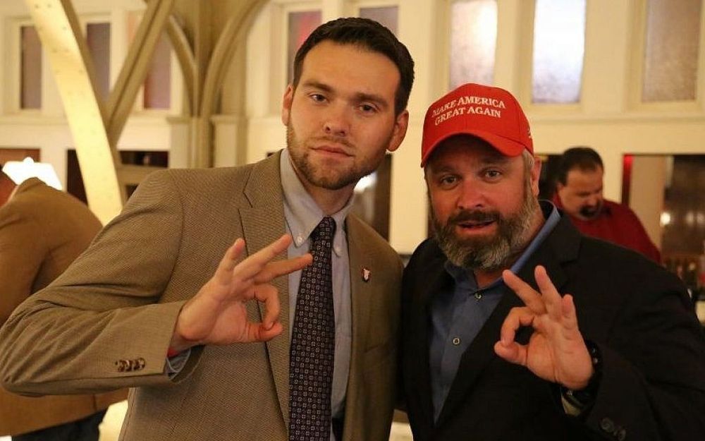 Jack Posobiec making “white power” 