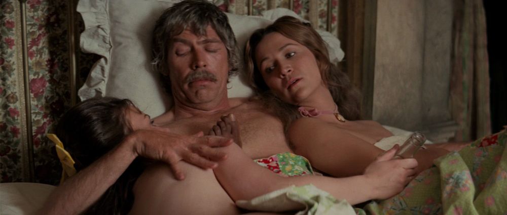 Pat Garrett inside the room in bed wi