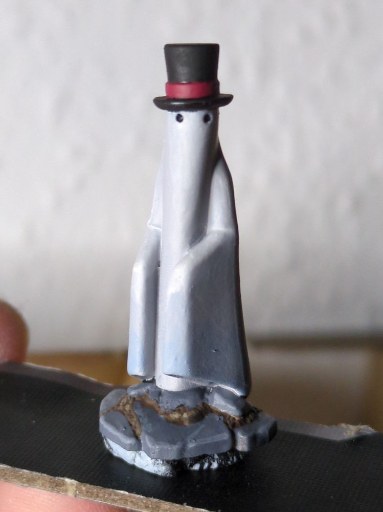 Painted miniature of a ghost with a top hat