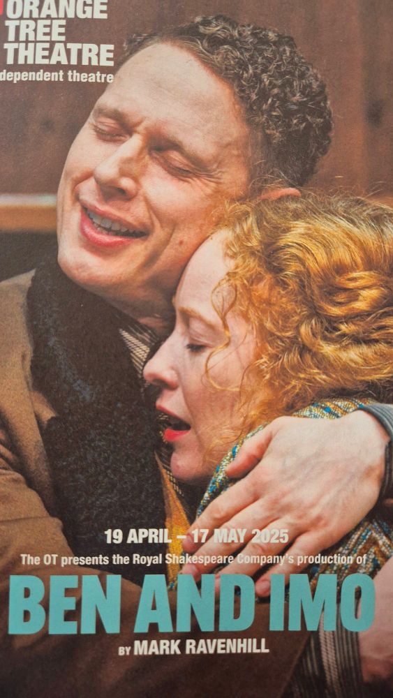 Samuel Barnett and Victoria Yeates as Benjamin Britten and Imogen Holst, on the programme of 'Ben and Imo' by Mark Ravenhill. Close-up of an affectionate embrace, her forehead to his left cheek. Both have their eyes closed, his left hand rests on her shoulder. 