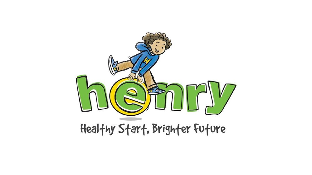 A child in a blue hoodie playfully climbs on the letter "o" in "henry." Below, the slogan reads: "Healthy Start, Brighter Future."